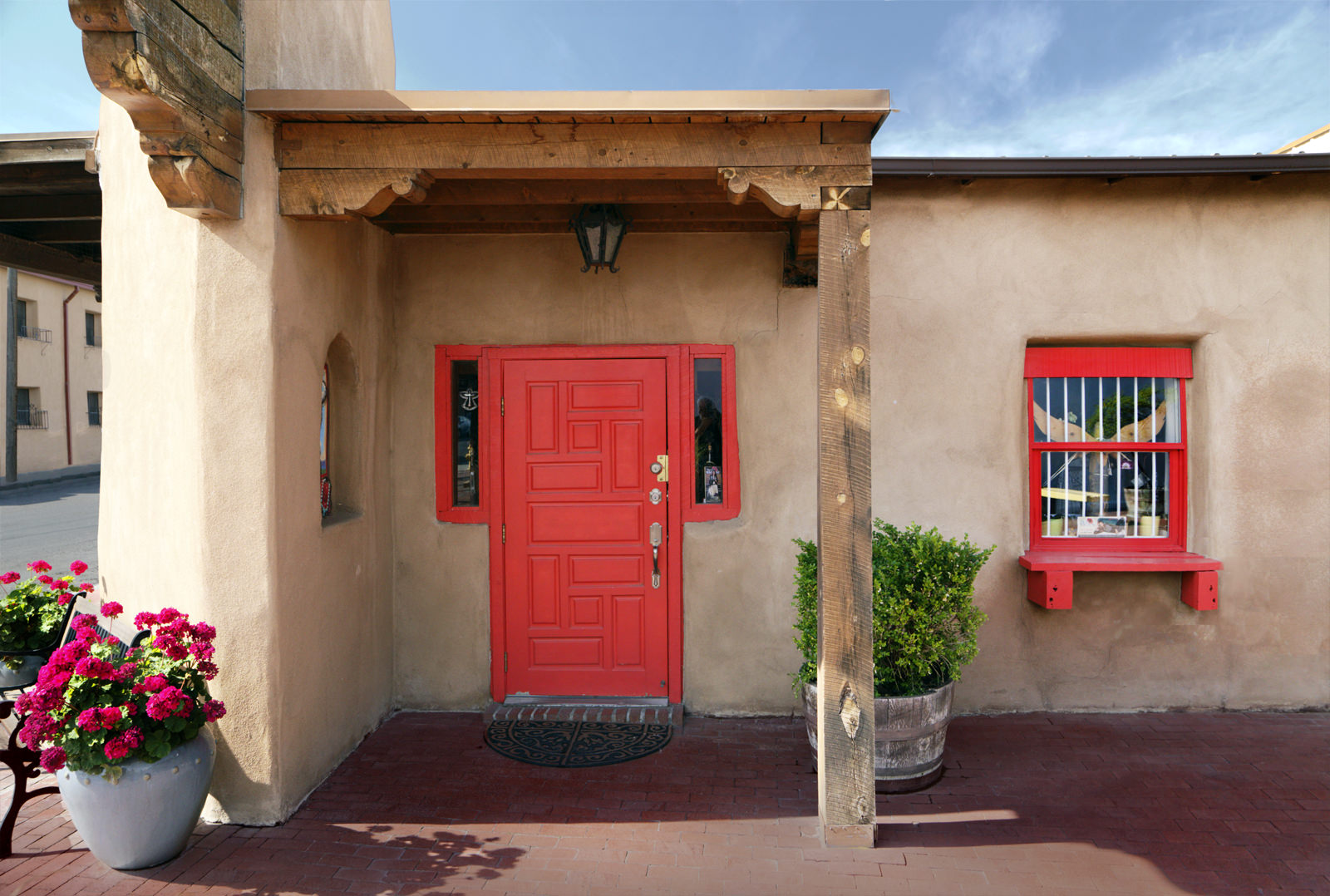 Adobe Dwelling with a Red Door