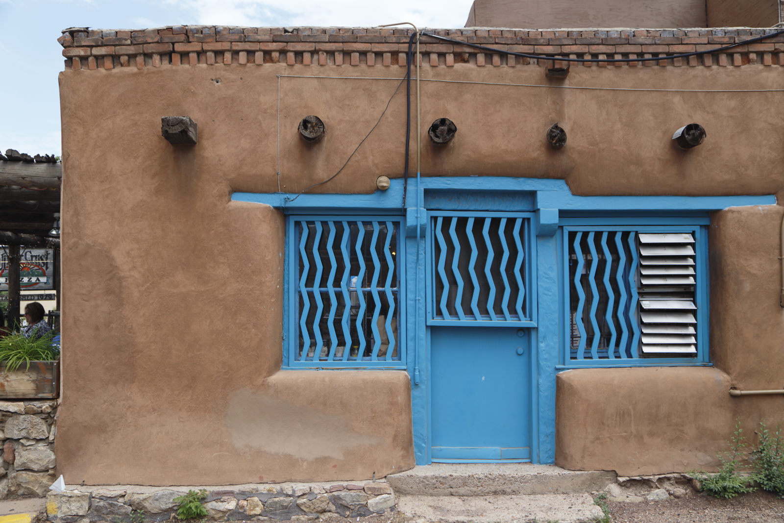 Tooth Capstone, Vigas, and Blue Fluted Windows